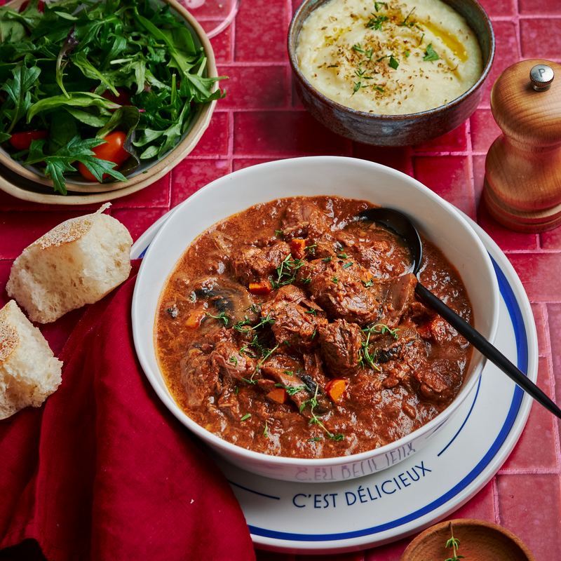 Bœuf bourguignon with green salad, crusty bread and celeriac purée